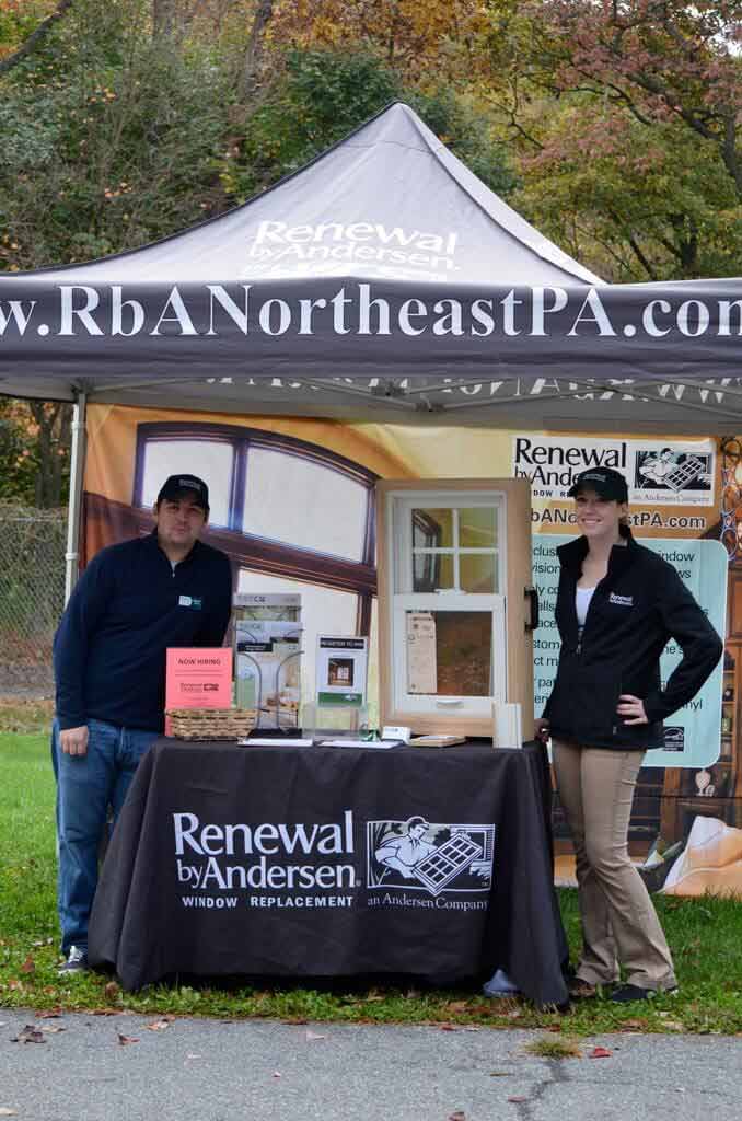 Richard and Andrea are enjoying the fall weather and ready to talk to customers about Renewal by Andersen!