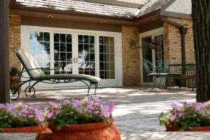 Showcase of sliding patio door with beautiful backyard