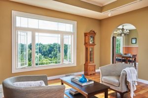 Picture and casement windows with various grille styles in living room
